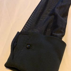 A sheer black button up top.
